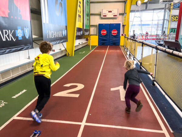 Kids run in the SportsWorks exhibit at the Carnegie Science Center in Pittsburgh, PA.