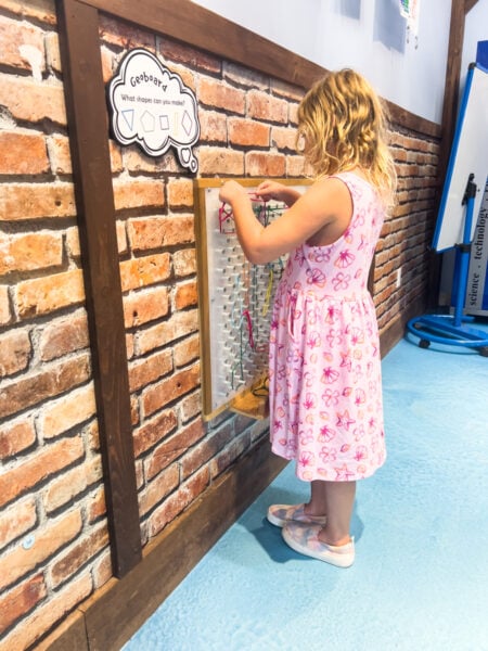 Little girl playing at the Bucks County Childrens Museum in New Hope PA