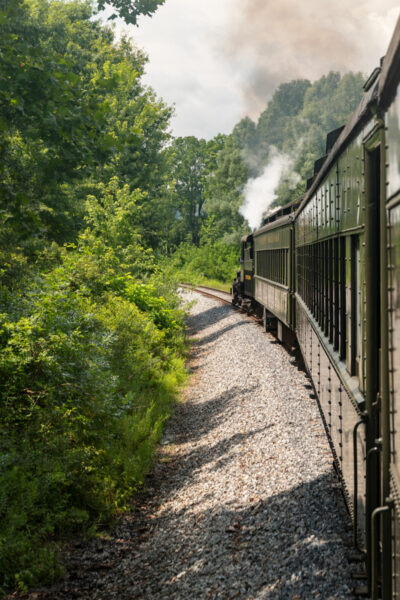 A steam locomotive goes down the tracks at the Everett Railroad near Altoona PA