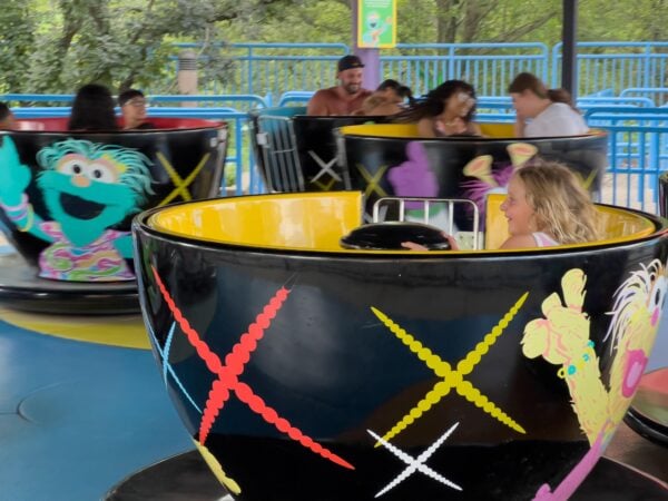 Girl in a spinning ride at Sesame Place in Bucks County PA