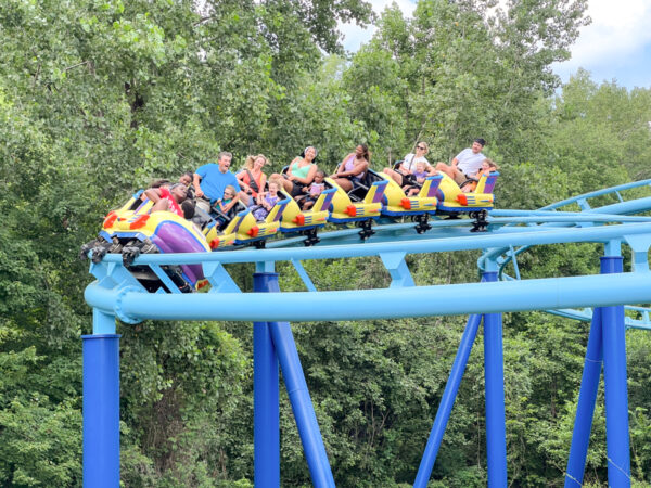 A rollercoaster on a blue track at Sesame Place Philadephia