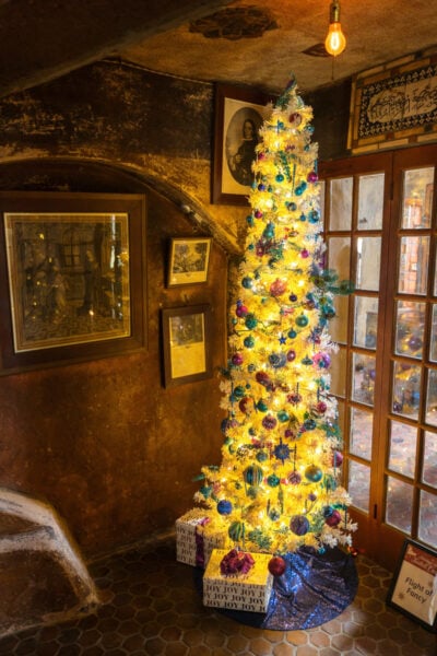 Christmas tree sitting in a corner at Holidays at Fonthill Castle in Pennsylvania