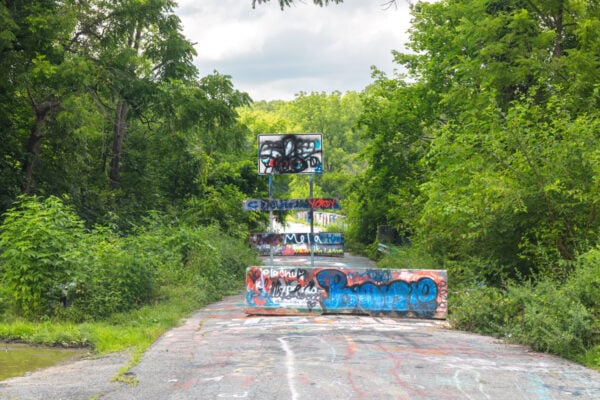 Concrete barrier blocking the roadway at Graffiti Bridge in Berks County Pennsylvania