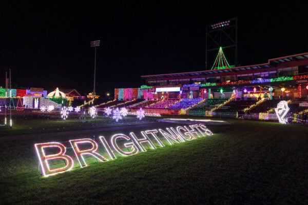 Bright Nights sign will stadium lights in the background