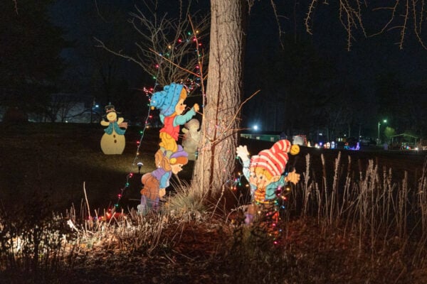 Elves climbing a tree at Christmas in the Park in Grove City PA