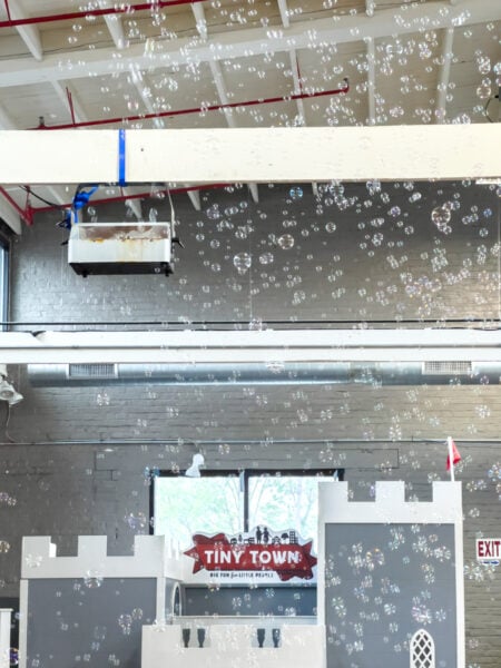 Bubbles raining down from the ceiling during the Bubble Party at Tiny Town in Lancaster PA