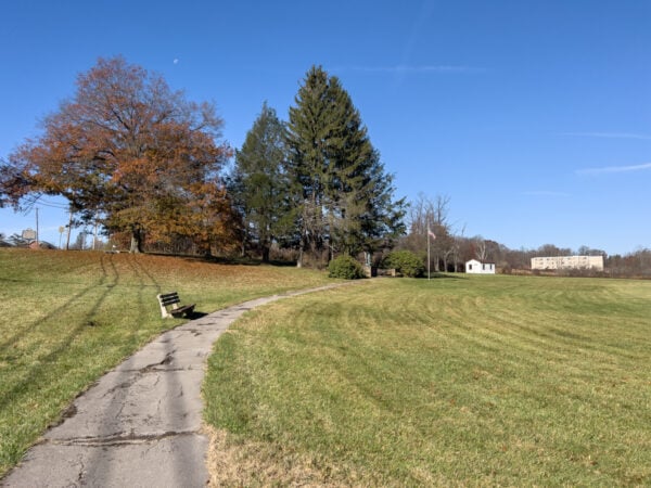 Stone pathway and a bench leading to the Admiral Peary Monument in Cresson Pennsylvania