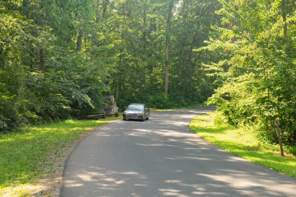Car parked on the side of the road near the Gettysburg Battlefield Dinosaur Footprints