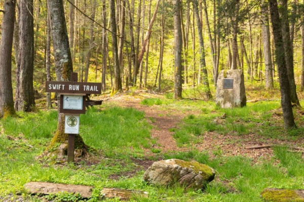 Wooden sign marking the start of the Swift Run Trail in the Snyder-Middleswarth Natural Area of Pennsylvania