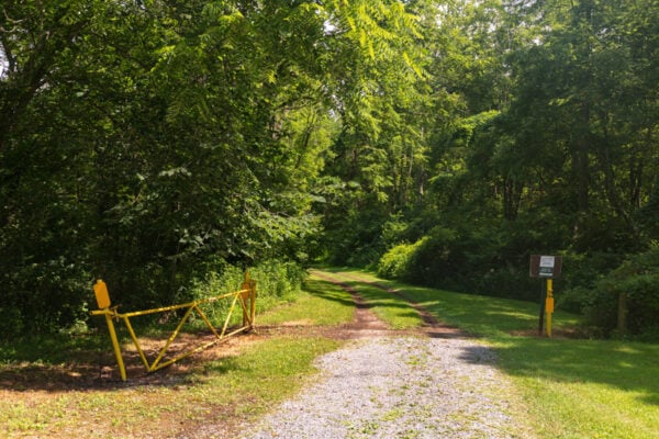 A gated trailhead for the River Trail Loop in Warriors Path State Park in Bedford County Pennsylvania