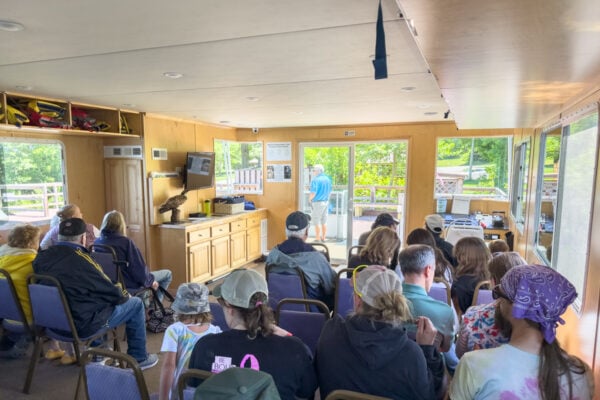 People sit in the lower deck of the Preston's Pearl in Moraine State Park in Butler County, Pennsylvania