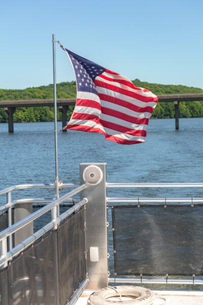 An American flag flaps in the wind at the back of the Preston's Pearl in Moraine State Park in PA