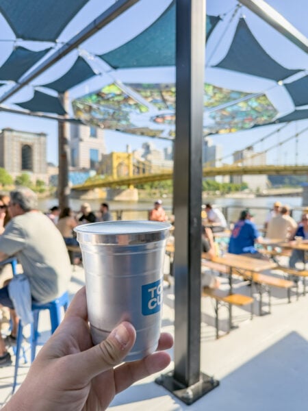 Person holding a beer on Shore Thing in Pittsburgh Pennsylvania