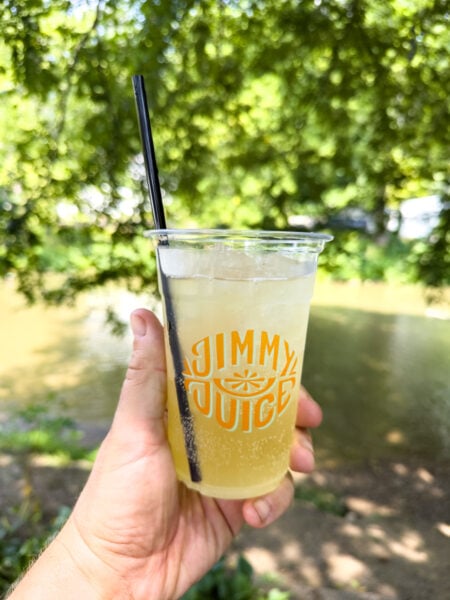 Holding a glass of Jimmy Juice at Sickman's Mill near Conestoga PA