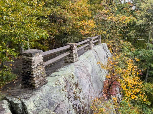 Stone and wooden fencing on the edge of Baughman Rock Overlook in Fayette County Pennsylvania