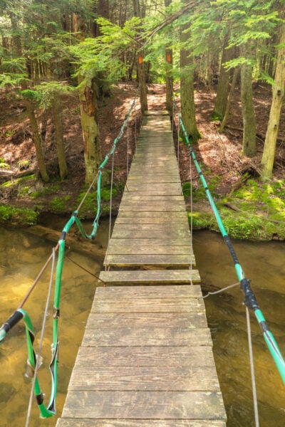 Looking down at the John P Saylor Trail Swinging Bridge and Clear Shade Creek in the Laurel Highlands of PA