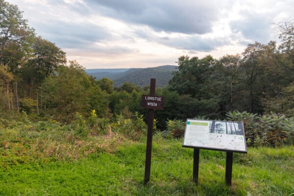 The view from Longtoe Vista in Potter County PA with signs in the foreground