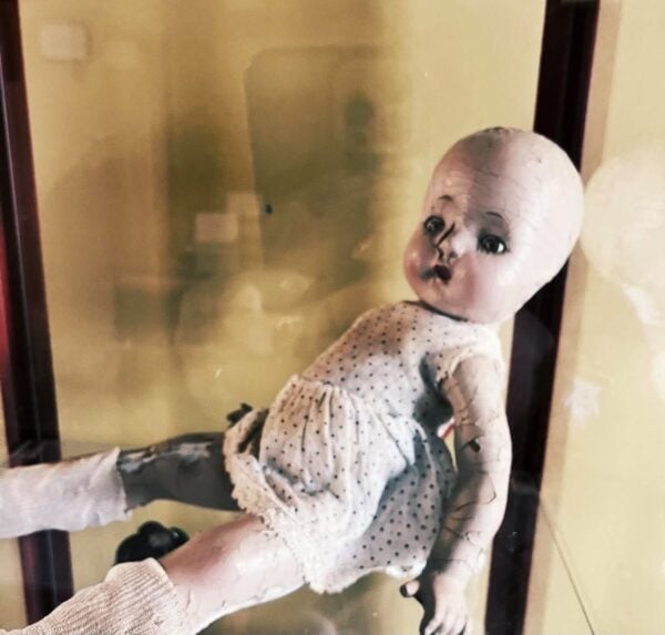 Doll inside a case at the Gettysburg Museum of Haunted Objects in Pennsylvania
